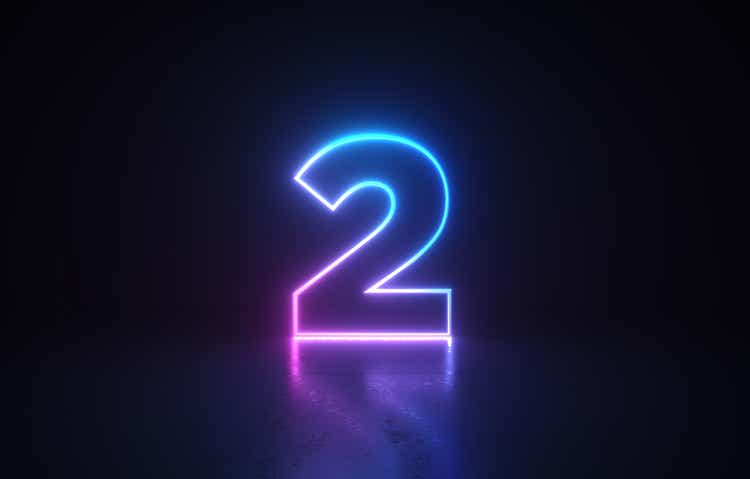 Glowing number 2 before dark background